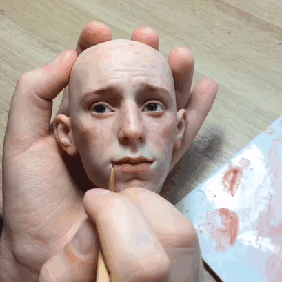 realistic-doll-faces-polymer-clay-michael-zajkov-1.gif