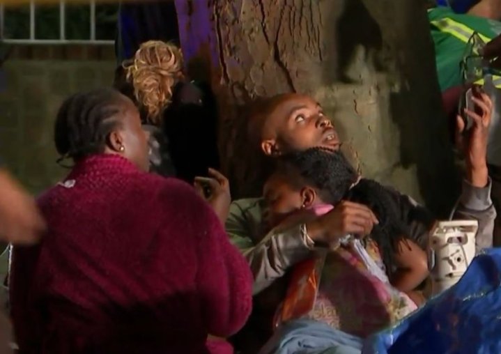 Girl, four, was caught by hero neighbour after she was thrown fr